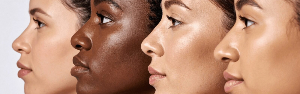 Side profiles of four diverse women with smooth, glowing skin representing professional skincare and waxing services in Germantown, TN, serving the Greater Memphis area.